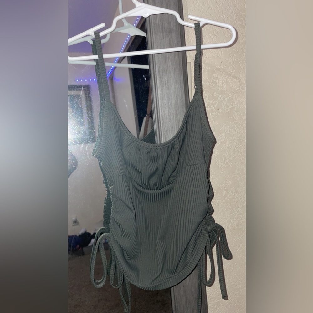Dark green tank top, adjustable straps, can make it cropped. From SHEIN and S